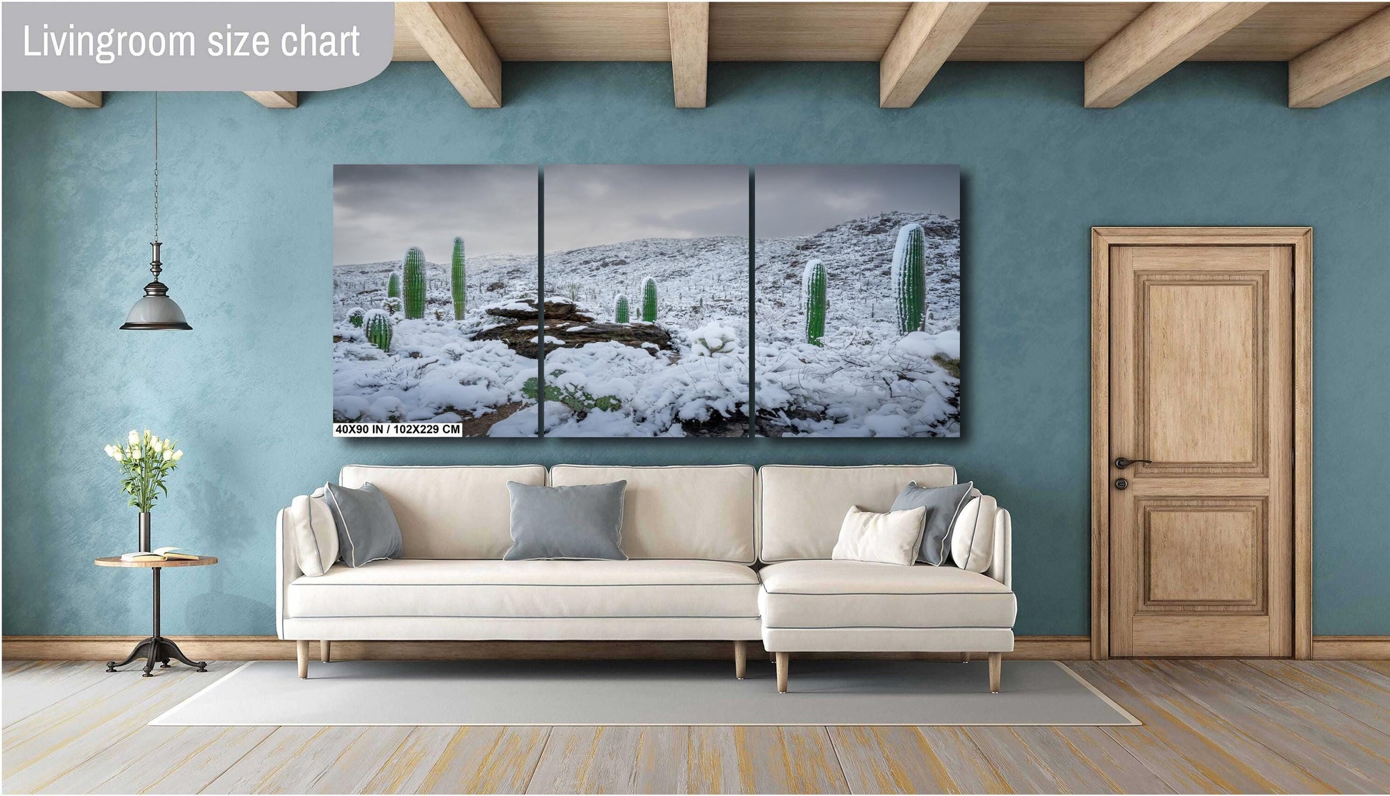 Snow-covered saguaro cacti in Arizona&#39;s desert, showcasing a rare winter scene with mountains in the background.