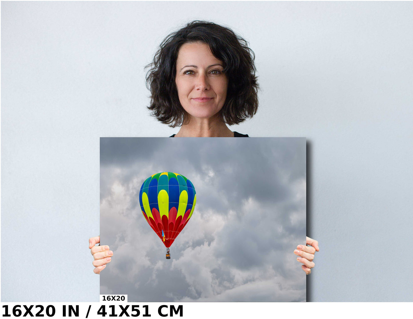 Vivid Balloon Against Dark Sky: A Colorful Hot Air Balloon Amidst Gray Clouds Wall Art Albuquerque Balloon Festival Metal Canvas Print