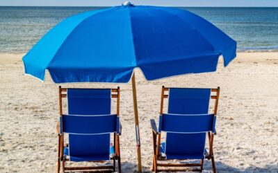 Oh, those blue chairs all lined up perfectly on the beach, giving you an amazing…
