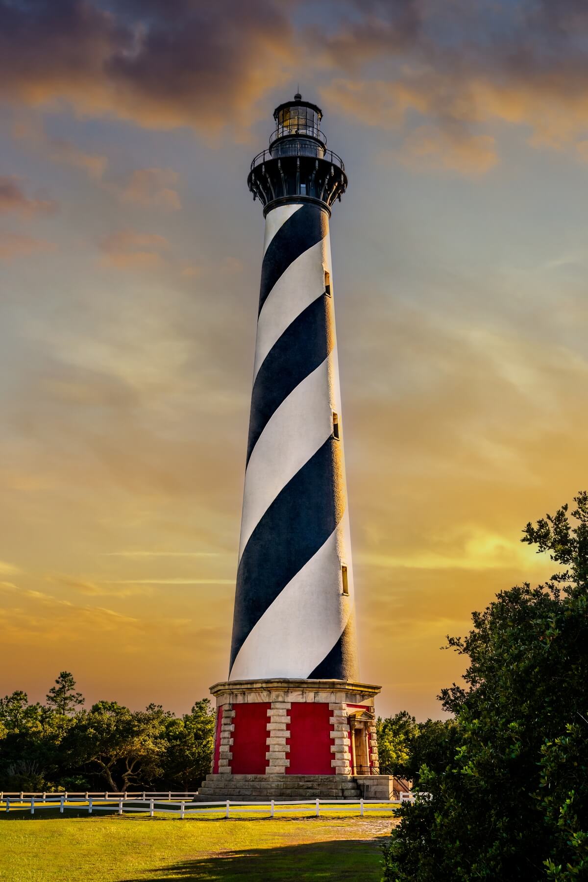 Lighthouse Majesty: Cape Hatteras Lighthouse in Sunny Clouds
