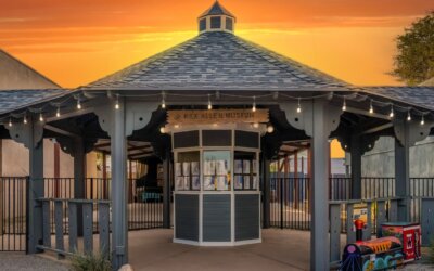Standing there, the colorful sky above the Rex Allen Museum in Willcox, Arizona,…
