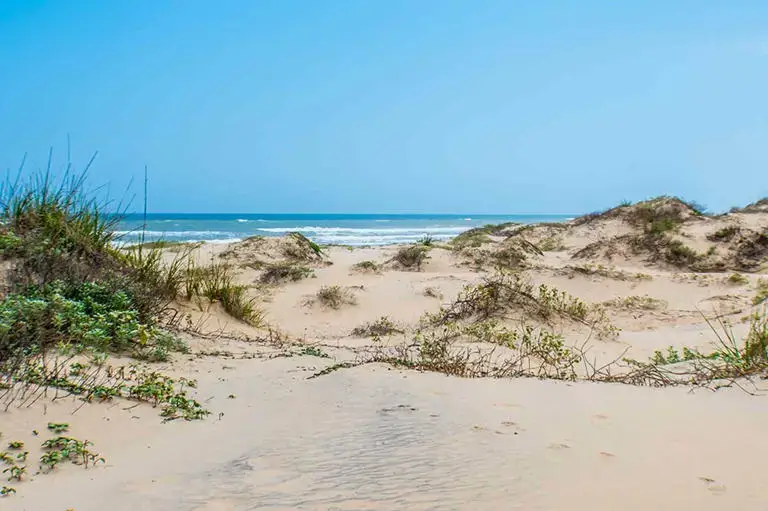 This Beach Town Is Known as the ‘Caribbean of Texas’—With Clear Waters, Powder Soft Sand, and Warm Weather Year-Round
