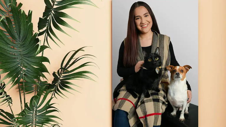 A modern, precision-crafted metal print featuring a portrait of a woman with her cat and dog, showcasing a durable and professional finish.