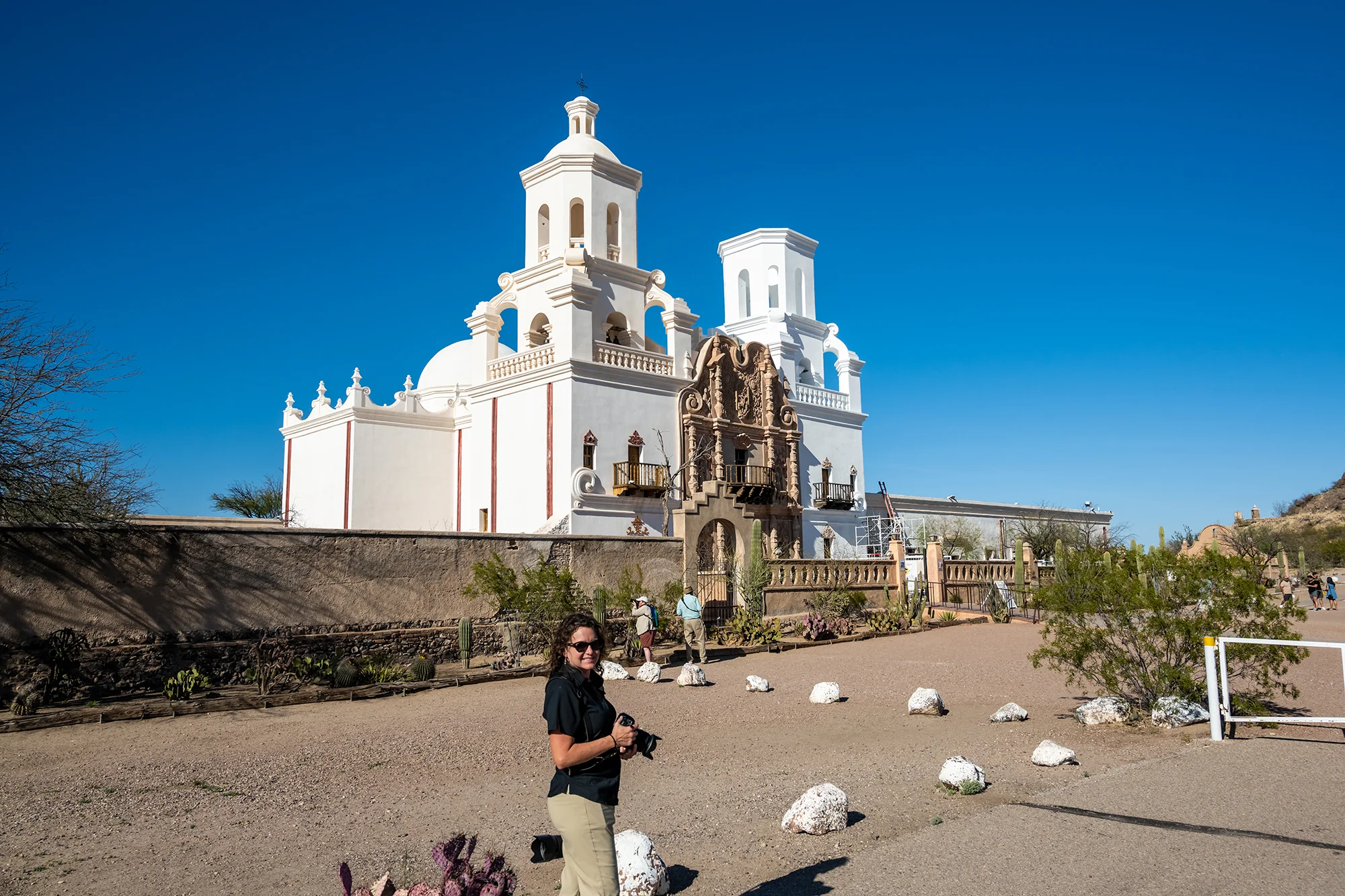 Cheri's Visiting the Historic San Xavier Mission Cheri's visiting the white towers of the San Xavier Mission on a sunny day in the Sonoran Desert.