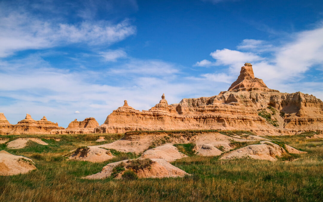 Badlands National Park Layered Buttes and Prairie Under Blue Sky South Dakota
