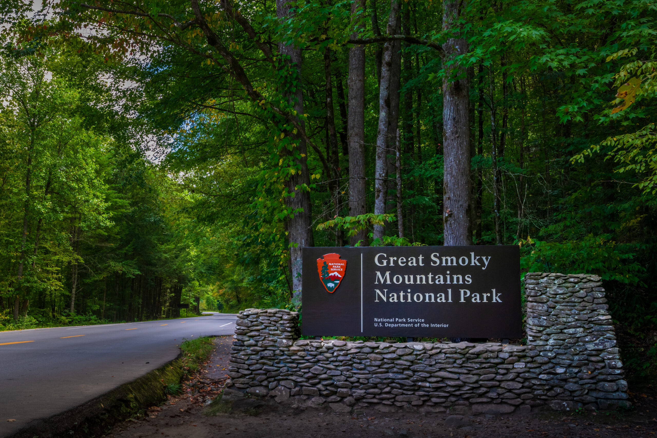 Great Smoky Mountains National Park Entrance Sign and Forest Road Great Smoky Mountains National Park Entrance Sign and Forest Road
