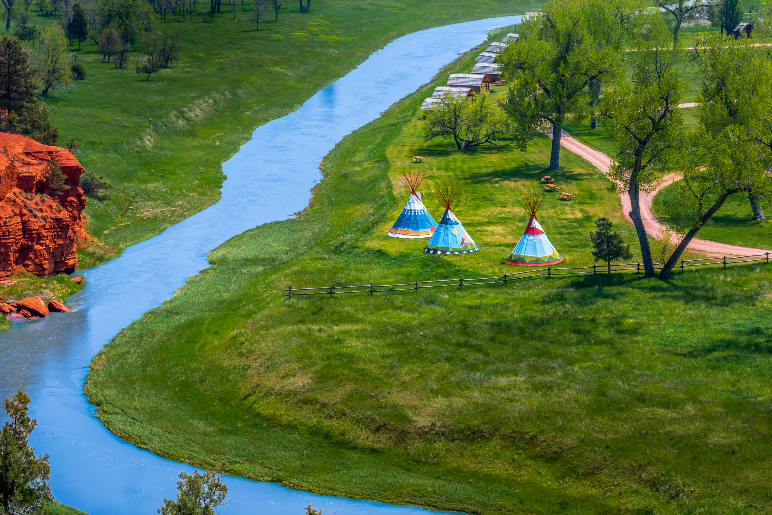 Painted Prairie: Tipis Along Red Cliffs Wyoming